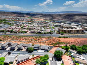 Aerial perspective of suburban area with mountains