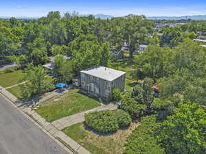View from above of property with a mountain backdrop