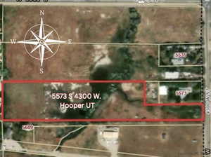 Aerial overview of property's location featuring property parcel outlined