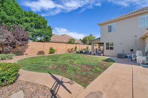 View of yard with a patio