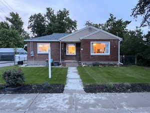 Bungalow with brick siding