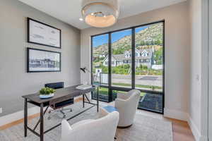 Office featuring baseboards and light wood finished floors