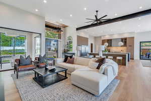 Living area featuring recessed lighting, light wood-style floors, and a ceiling fan