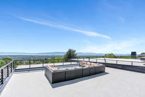 View of patio / terrace featuring an outdoor hangout area and a mountain view