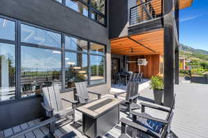 View of patio featuring a mountain view and outdoor dining area