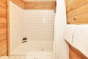 Combined bath with shower and jetted tub