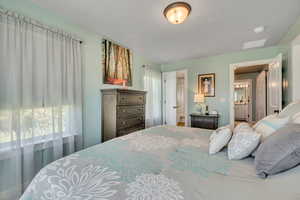 Bedroom featuring connected bathroom
