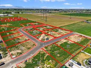 Aerial overview of property's location with property boundaries highlighted and mountains