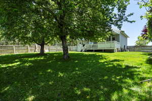 View of yard with a deck