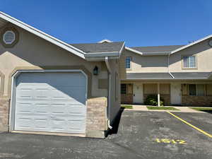 Attractive stucco exterior with garage facing west for plenty of sunshine