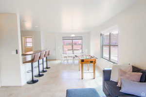Game room with baseboards
