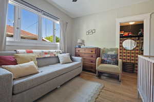 Living area with wood-type flooring