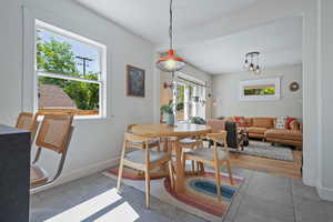Dining room with baseboards and tile patterned floors