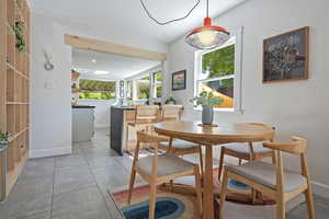 Dining room featuring baseboards and recessed lighting