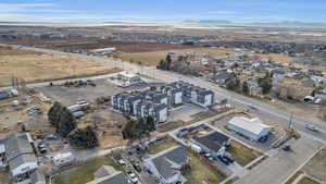 Aerial perspective of suburban area with a mountain backdrop