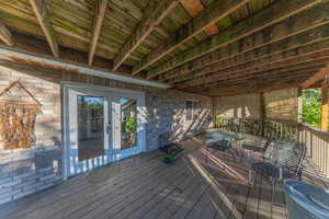 Covered deck with french doors.