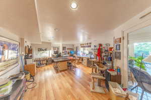 Large finished space with lots of recessed lighting.  Perfect family room, art studio, office, or playroom.