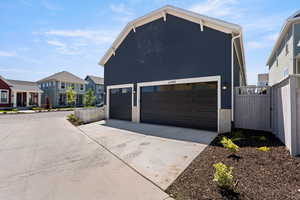 Garage with driveway and a residential view