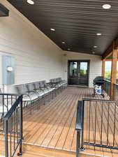 Deck featuring a grill and french doors