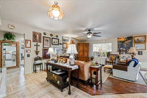 Living room featuring ceiling fan