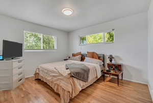 Bedroom featuring light wood-style flooring