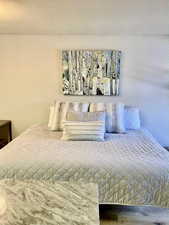 Bedroom with a textured ceiling