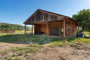 View of outbuilding with a mountain view