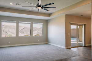 Empty room with baseboards, ceiling fan, and recessed lighting