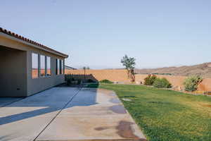 View of yard with a patio area
