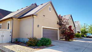 View of garage and alley