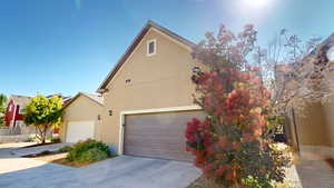 View of garage and alley