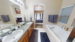 Ensuite bathroom with separate tub and shower