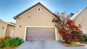 View of garage and alley
