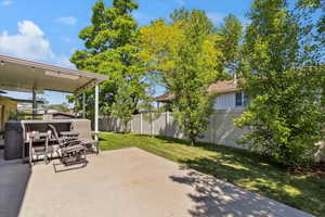 View of patio featuring a hot tub