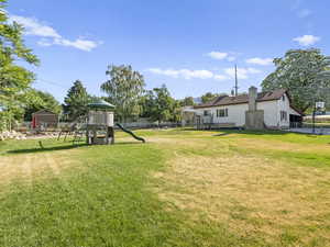 View of yard with a playground