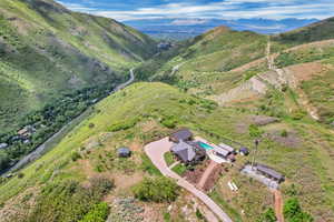 Aerial overview of property's location with mountains