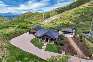View from above of property featuring a mountainous background