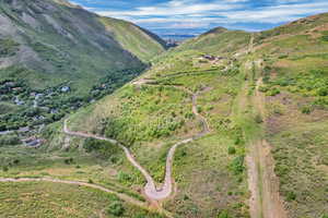 Aerial view of property's location with a mountainous background