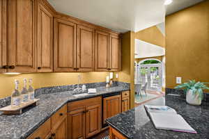 Wet bar adjacent to theatre area.