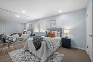 Cute bedroom with mirrored walls.