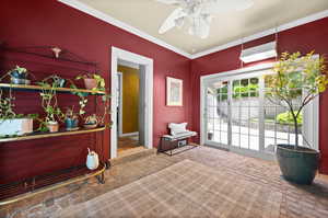 Between house and large garage.