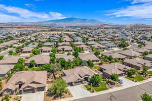 Aerial view of residential area with a mountainous background