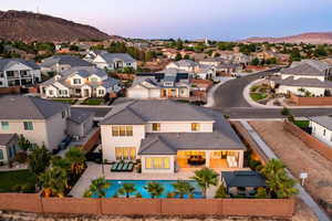Aerial view at dusk of a residential view and a mountain view