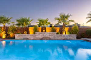 View of pool featuring a fenced backyard