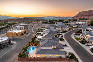 Aerial view at dusk of a mountain view and a residential view