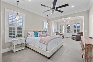 Carpeted bedroom with crown molding, multiple windows, recessed lighting, access to exterior, and a ceiling fan