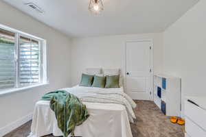 View of carpeted bedroom