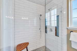 Bathroom with tiled shower
