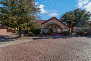Mediterranean / spanish home with stucco siding