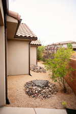 View of yard with an outdoor fire pit